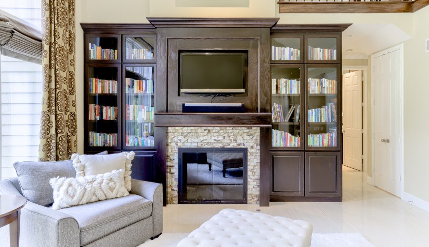 built in cabinets with beautifully crafted fireplace